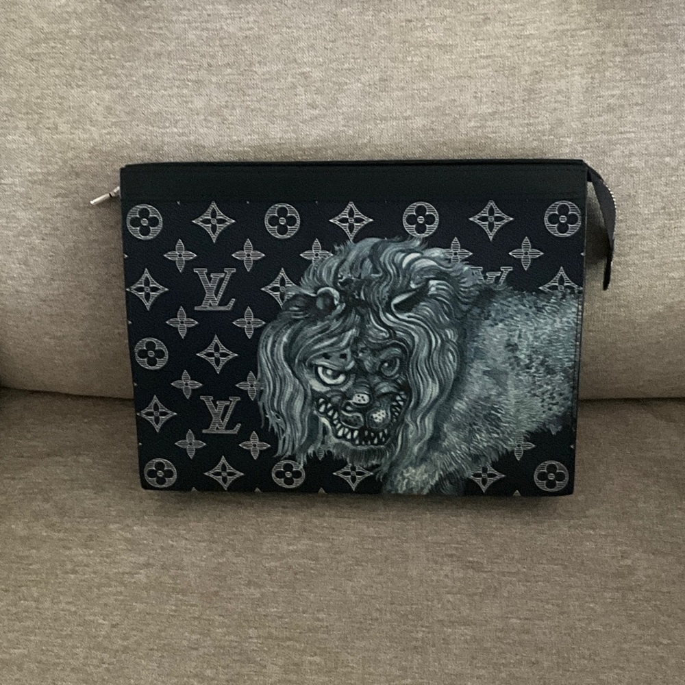 Louis Vuitton Chapman Lion Pochette Voyage